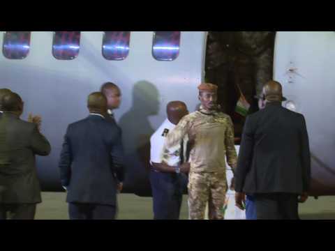 Ivorian soldiers land in Abidjan after Mali pardon