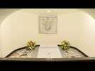 Faithful pray as Pope Benedict XVI's tomb opens to public