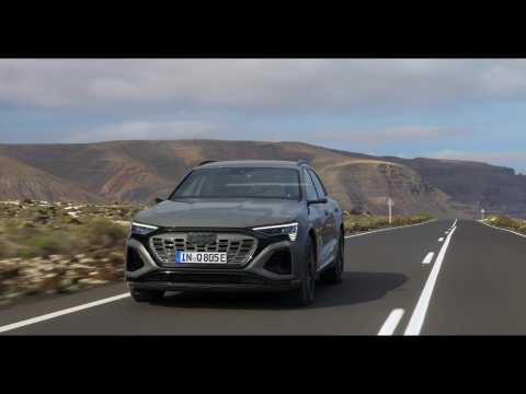 The new Audi Q8 e-tron in Chronos Gray Driving Video