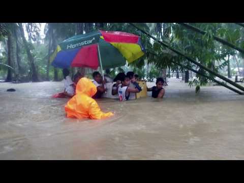 Tens of thousands evacuated after Christmas Day flooding in the Philippines