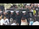 Pele's coffin leaves Vila Belmiro stadium ahead of funeral procession
