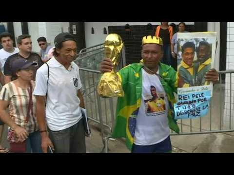 Brazilians queue to see Pele's coffin as wake draws to a close