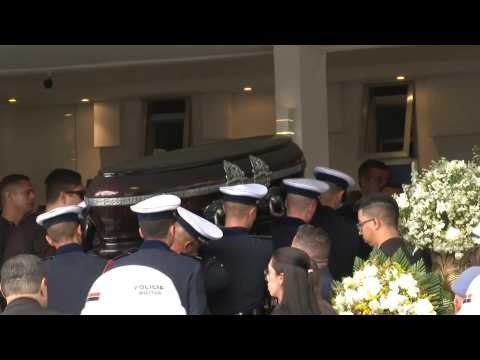 Brazilian football great Pele's coffin arrives at cemetery