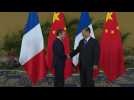 Macron, Xi shake hands as talks start in Bali