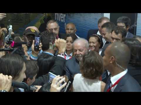 Brazil's Lula greets supporters upon arrival at COP27