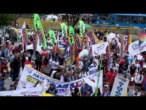 Gustavo Petro supporters march in Bogota to celebrate 100 days in office