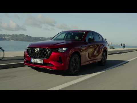 All-new 2022 Mazda CX-60 in Soul Red Crystal Driving in Portugal