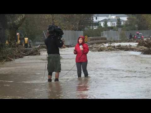 Flooded street in Montecito as California reels from storm onslaught