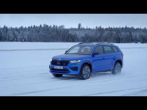 The new Skoda Kodiaq RS in Race Blue Driving in the snow