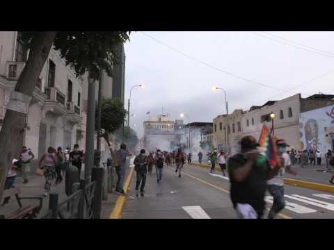 Peruvian police fire tear gas on protesters during march in Lima