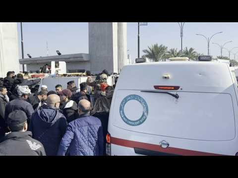 Ambulances outside football stadium after deadly stampede in Iraq