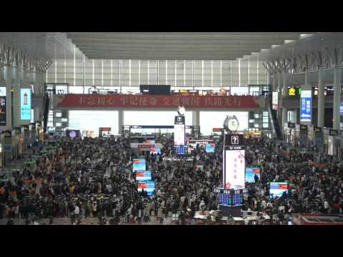 China: Passengers at railway station as annual migration begins