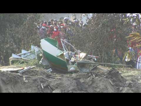 Rescuers retrieve bodies from Nepal plane wreckage site