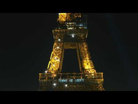 Slogan in support of Iranian people displayed on Eiffel Tower