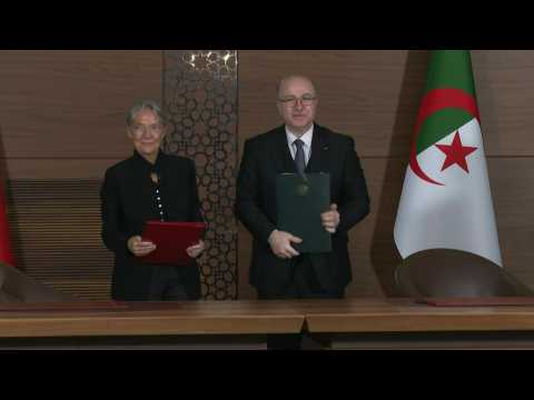 French PM and Algerian counterpart sign agreements during ceremony in Algiers