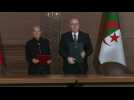 French PM and Algerian counterpart sign agreements during ceremony in Algiers
