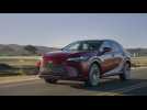 All-new 2023 Lexus RX 350h AWD in Matador red Driving Video