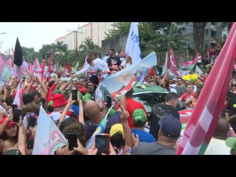 Brazil's Lula marches alongside supporters in Rio favela ahead of second round
