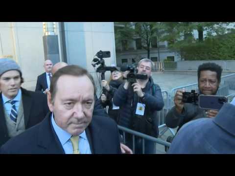 Kevin Spacey leaves court after being cleared by jury in sex assault case