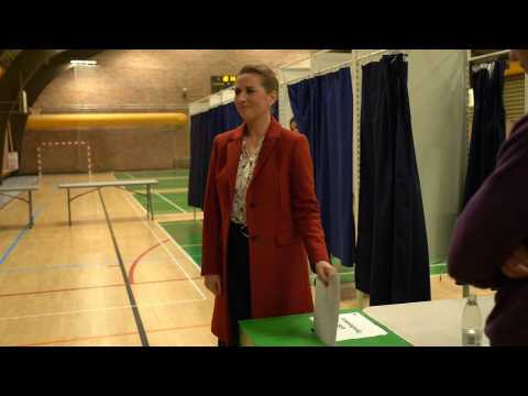 Prime Minister Mette Frederiksen votes in tight Denmark election