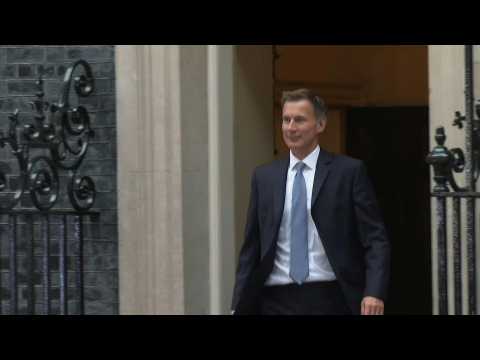 New UK Finance Minister Jeremy Hunt leaves Downing Street