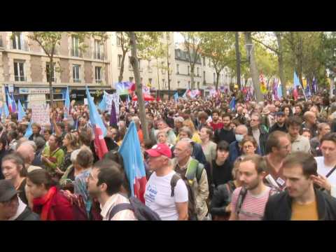 Thousands of people march in Paris against the rising cost of living