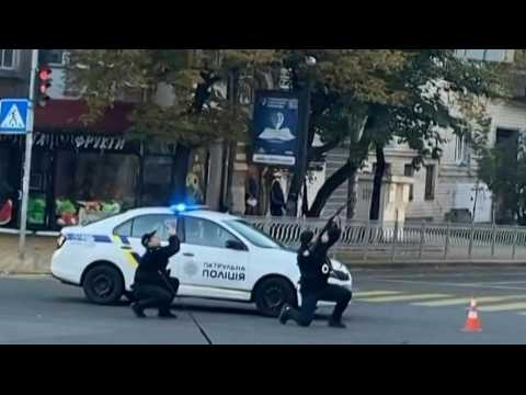 Ukrainian police fire at drones swooping low across Kyiv skies