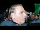 Brazil's Bolsonaro greets supporters after presidential debate