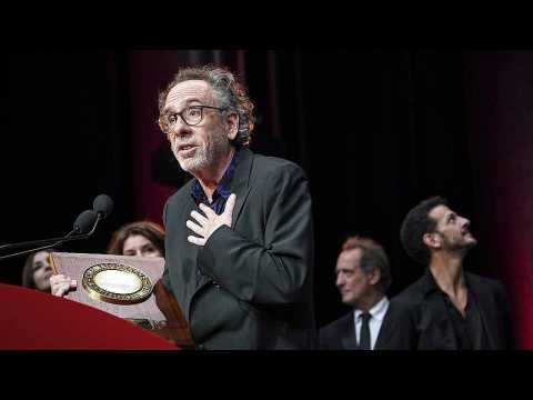 Tim Burton moved to tears as he received recognition for decades-long career at the Lumière Festival