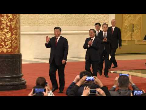 Xi leads new lineup of top Chinese Communist Party officials