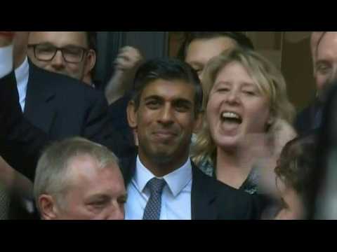 Incoming British Prime Minister Rishi Sunak arrives at Conservative Party headquarters