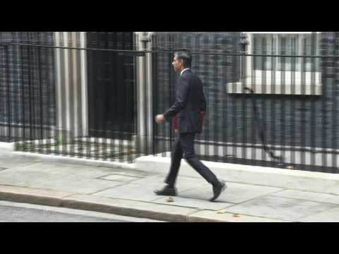 New UK Prime Minister Sunak leaves Downing street to go to Parliament