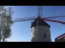 Pose des ailes sur le moulin de Bussus-Bussuel