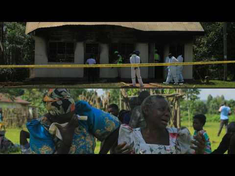 Families mourn 11 killed in fire at Uganda school for the blind
