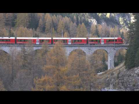 World's longest passenger train winds through Swiss Alps