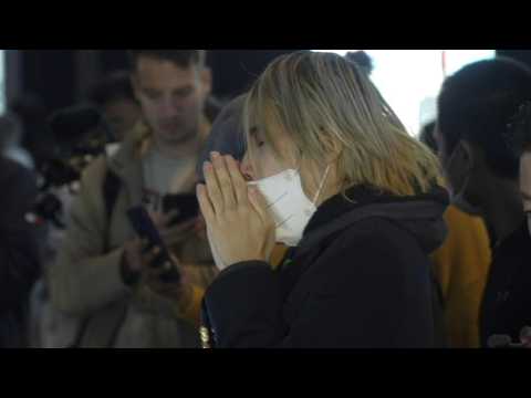 Seoul crush: mourners lay flowers at the scene