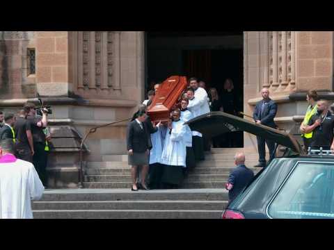 Protesters chant 'go to hell Pell' as late Australian cardinal's casket leaves cathedral