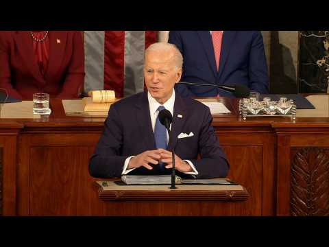 Biden says US democracy 'bruised' but 'unbroken'