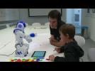 Children learn to write by teaching robots