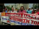 Greek civil servants, pharmacists strike against bailout reforms