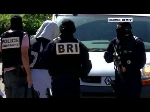 French attack suspect taken to his home under heavy police guard