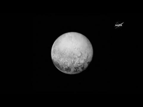 Pluto probe on course for fly-by