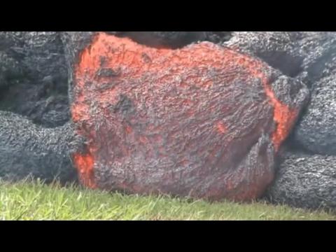 Hawaii lava flows slows, couple arrested for lava 'selfies'