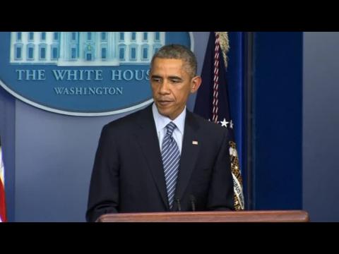 Obama urges people of Ferguson to react peacefully