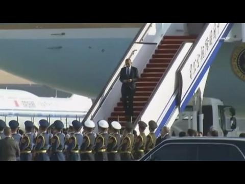 Obama arrives in Beijing to attend APEC summit