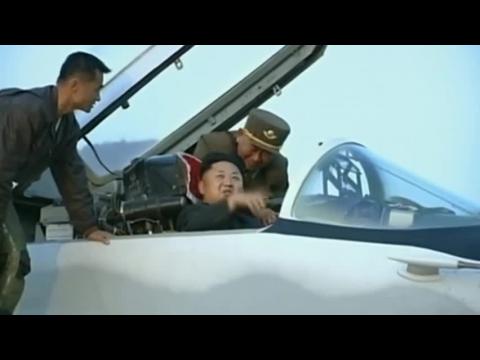 North Korea's Kim watches military drills, boards fighter jet - State TV