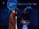 Young Fathers win the 2014 Barclaycard Mercury Prize