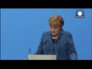 Merkel celebrates coalition deal with Social Democrats