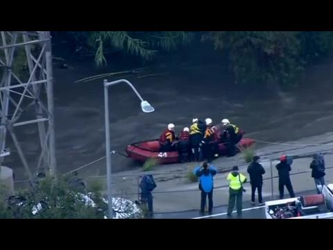 Team rescues people stranded by flooded Los Angeles River