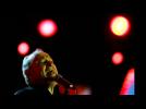 Raspy-voiced British soul singer Joe Cocker dies at 70